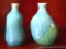 Pottery bud vases are pretty and in good shape. Each stands 4-1/2
