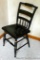 Sturdy little dining or side chair is in good condition has a partial label on bottom noting