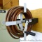 Reel with W64 air compressor hose. Roll of hose is 16