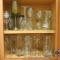 Assorted barware including margarita glasses, martini glasses, iced tea tumblers, wine glasses, etc.