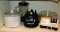 Two quart Rival slow cooker; Black & Decker Crush Master blender; Chef's Choice knife sharpener; all