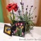 Faux amaryllis is approx. 2' tall; plus another faux flower arrangement and two framed flower