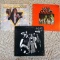 Three Alice Cooper LP records - titles include Easy Action, Love it to Death and Welcome to My