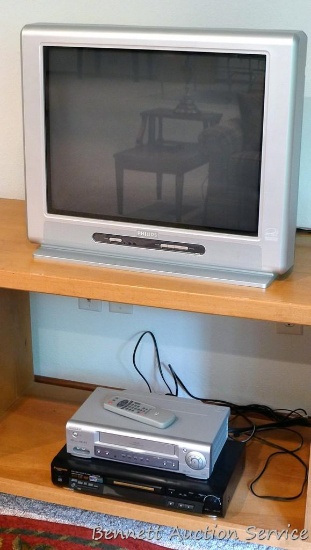 24" Philips television set; Magnavox VHS player; Panasonic DVD/Video CD/CD player, model DVD-RP56
