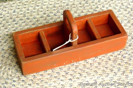Wooden tote box would be great for display or storage. Measures 18" x 7" x 7-1/2" to top of handle.