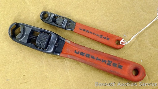 Craftsman 6" & 10" adjustable tool holders.