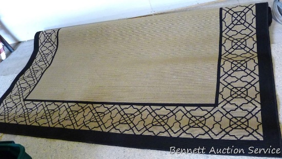 8' x 10' outdoor area rug appears near new.