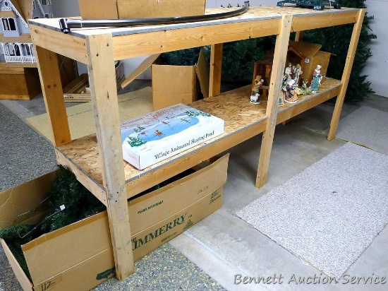Sturdy wooden shelving unit measures 8' wide x 46" high x 21" across.