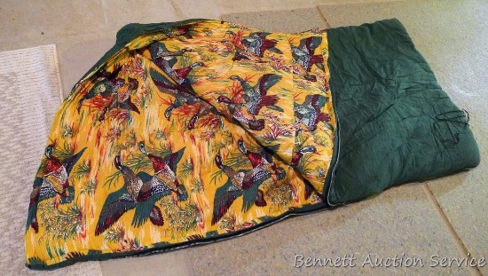 Nice older style sleeping bag is in good condition overall - one small tear near pin/zipper - should