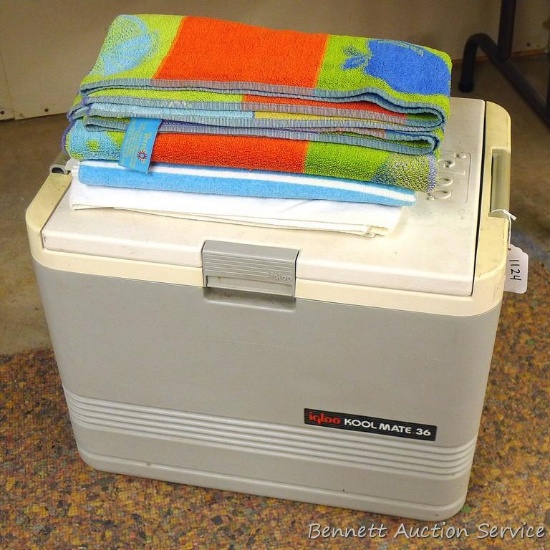 Igloo KoolMate 36 cooler with car adapter; two beach towels. Cooler is in good shape, measures 21" x
