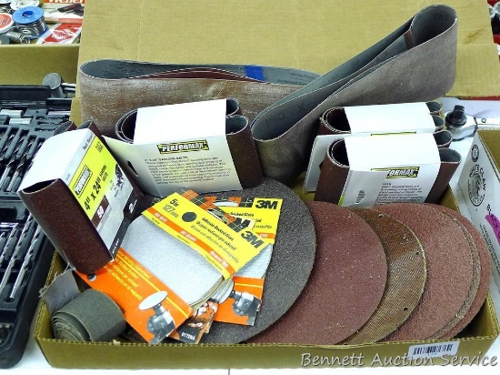 Sanding belts and discs. Four pkgs. 4" x 24" NIP, three pkgs. 5" discs NIP, six 9" discs, five 7"