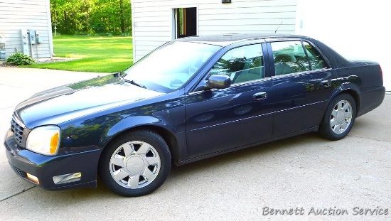 2001 Cadillac DeVille DTS Touring Sedan with 164,554 miles, VIN 1G6KF57931U252248. North Star 32