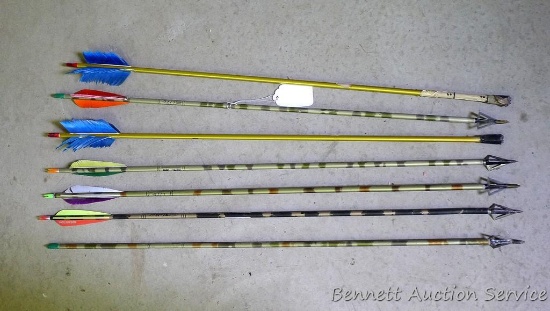 Six Easton Camo Hunter XX75 fiberglass arrows with broad heads are 32" long;