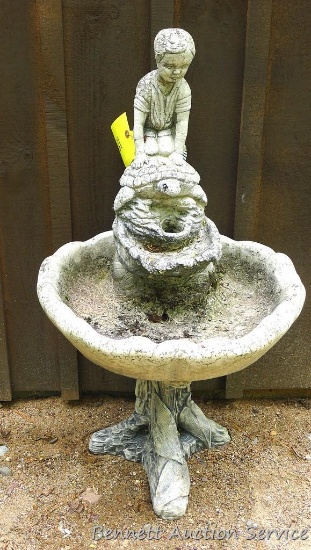 Concrete garden fountain stands just over 3' tall. In good condition