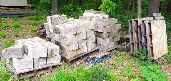 Three pallets of split face retaining wall block, plus some cap block. Retaining wall block is 12"