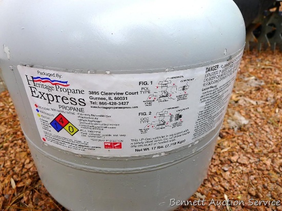 Spare 20 lb propane tank with new style OPD valve.