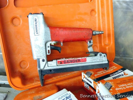 Paslode staple nailer in carrying case incl partial boxes of 3/4" and 1-1/8" staples.