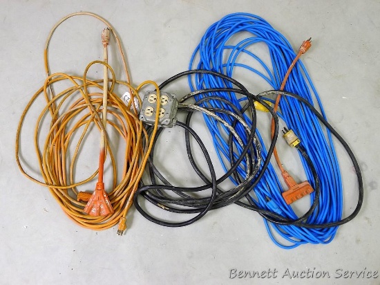 Homemade extension cord with a 4 outlet, two 3 prong adapters, 100 ft extension cord and other
