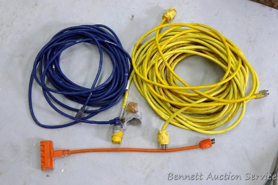 3 Construction extension cords and 3 prong adapter. Longest cord is approx 100 ft. Some have tape on