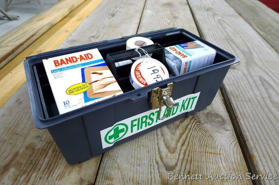 First Aid kit includes bandages, Bandaids, tape, more in 16" x 8" x 7" plastic toolbox.