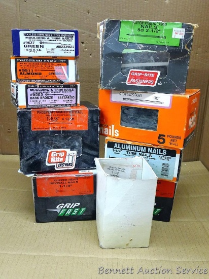 Plastic pail of partial boxes of screws and nails, galvanized and aluminum. Pail measures 11" x 11".