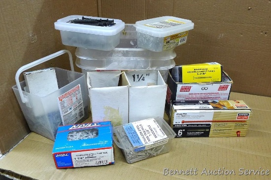 Plastic pail of partial boxes of screws and nails, galvanized and aluminum. Pail measures 11" x 11".
