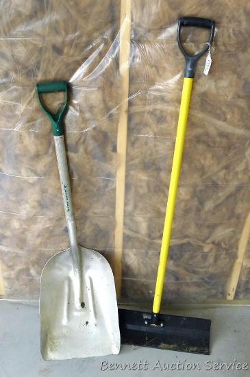 Fiberglass handled snow shovel with 22" head and aluminum grain shovel is 14" x 20" and shows some