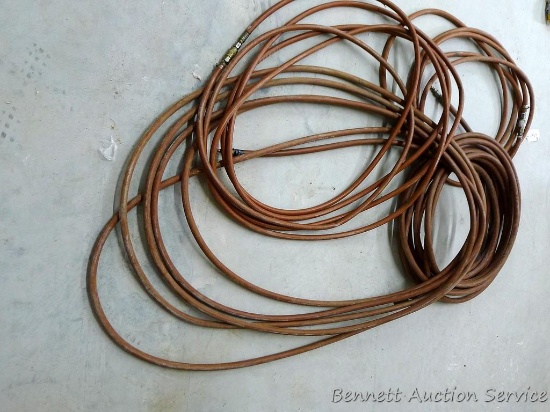 Approx. 25ft, 35ft, and 2 @ 50ft rubber air hoses with air couplers.