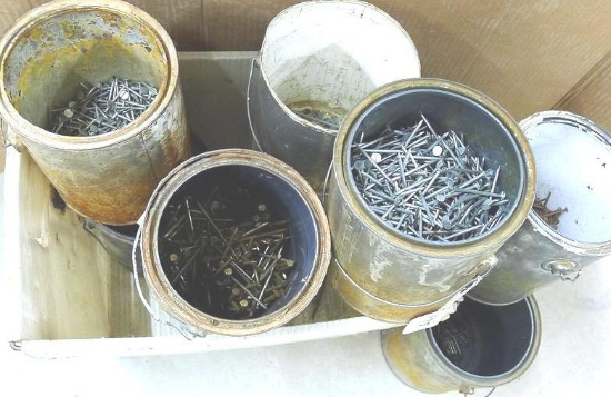 Paint cans partially filled with assorted nails, longest is 3".