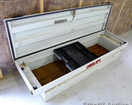 Metal Delta truck tool box has sliding tray, is 70" x 21" x 15" tall and shows moderate use.