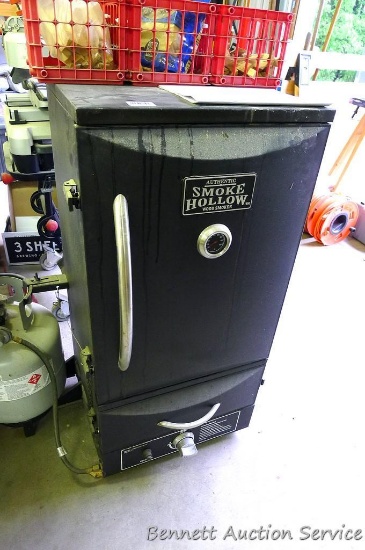 Smoke Hollow Deluxe wood smoker model 41170B is 20" x 19" x 42". Comes with smoking chips, operator