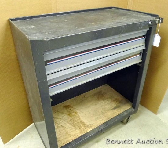 Metal rolling tool cabinet with two 4" drawers and storage shelf below. Overall dimensions are 29" x