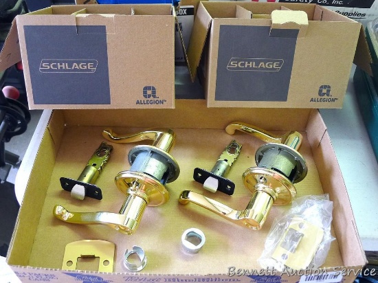 Two Schlage Passage latches F10 GEO 716 CAM. Did not check to see if all small parts are present.