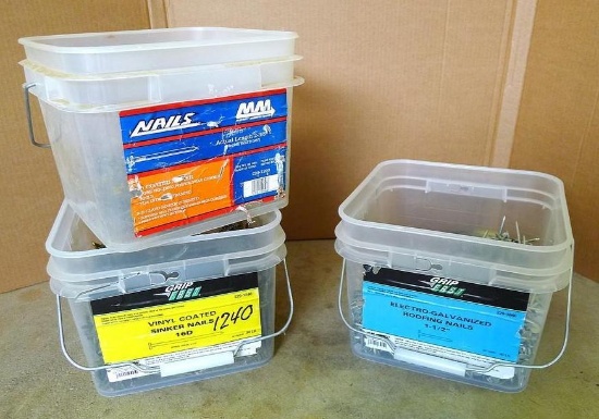Partial buckets of 8D sinker nails, 1-1/2" galvanized roofing nails and 16D vinyl coated sinker