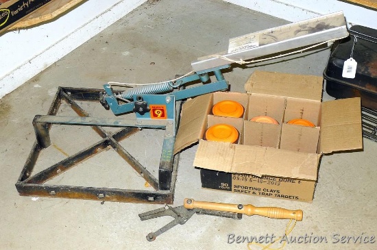 Hoppe's 9 spring loaded clay pigeon thrower has a 19" square base; hand thrower; partial box of