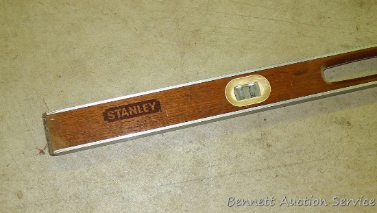 Beautiful 6' Stanley level with mahogany body and bound edges.