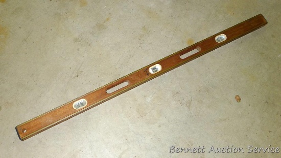 4 Ft Pro Carpenter Series mahogany level with brass bound edges, vials look in good shape.