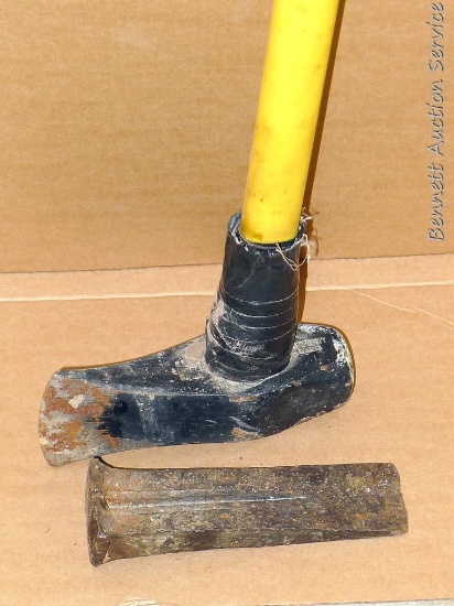 Fiberglass handled splitting maul is 8" x 33" tall and metal splitting wedge is 8" long.