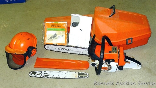 Stihl 026 chainsaw with 16" bar. Comes with owner's manual, extra chain and bar, plastic bar