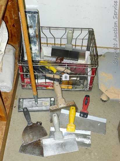 Steel milk crate with drywall tools incl mudding trowels and mudding pan. Crate is 19" x 11" x 12".