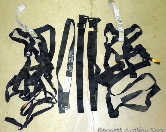 Two body harnesses for hunting have a 300 lb. weight limit. Lot also has 3 extra straps.