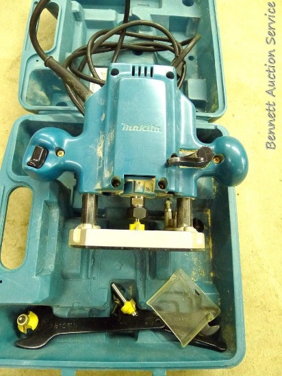 Makita router, model 3620, comes with some router bits and carrying case, runs.