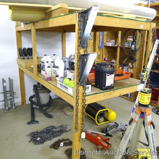 Sturdy homemade wooden shelf is built out of 2x4s and chip board and is 4' x 8' x 93" tall. Please c