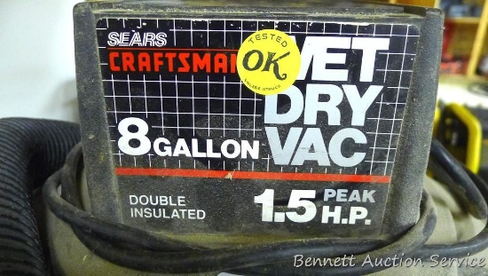 Sears Craftsman 8 gallon wet/dry vacuum, 1.5 hp, includes hose with wand. Inlet hose is taped.