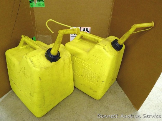 Two 6 gallon diesel totes with nozzles and air intake.