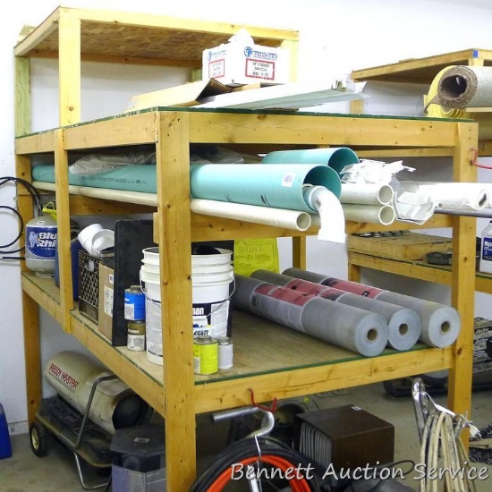 Sturdy homemade wooden shelf is built out of 2x4s and chip board and is 4' x 8' x 93" tall. Please c