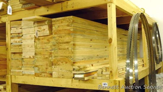 8" and 10" planed pine boards that are 8' long plus more.