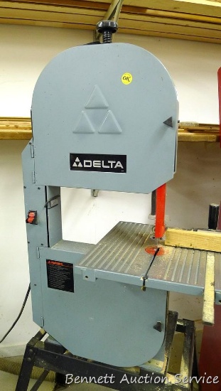 Delta 12" bandsaw, model 28-190, mounted on metal base, measures 24" x 66" tall x 26", runs.