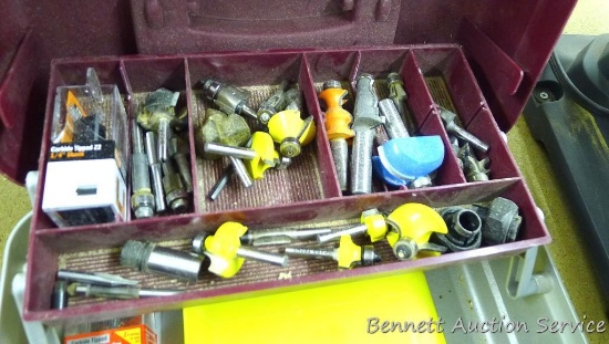 Plano tackle box filled with router bits and parts, largest is 2". One 3/8" roundover/beading bit