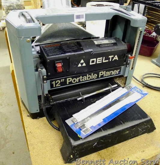 Delta 12" portable planer model 22-540, 8,000 RPM. Comes with extra blades, some NIP. Runs.
